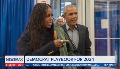 Newsmax chyron saying "Democrat plan for 2024" with an image of Michelle and Barack Obama