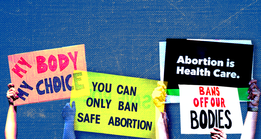 Pro-choice abortion protest signs appear in front of blue background