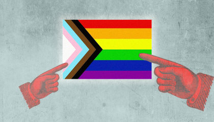 gay pride flag with fingers pointing at it