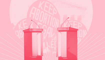 Two debate lecterns in front of signs that read KEEP ABORTION LEGAL