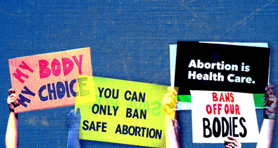 different protest signs read "My Body My Choice"; "You can only ban safe abortion"; "Abortion is healthcare"; "Bans off our bodies"